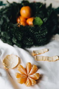 Still life of mandarin oranges with leaves thumbnail