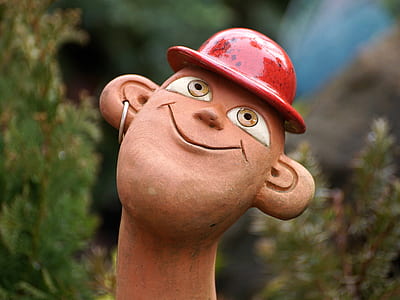 man with red hat garden decor thumbnail