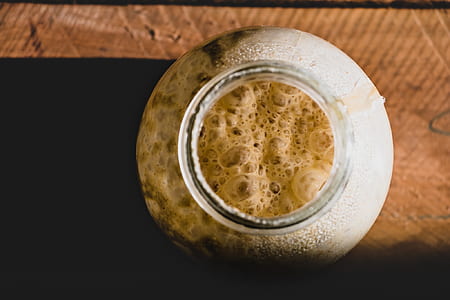 jar filled with brown liquid thumbnail