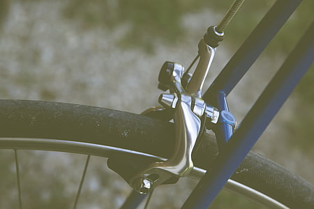 low-light photo of chrome V-brake thumbnail