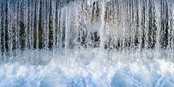 water falls during daytime thumbnail