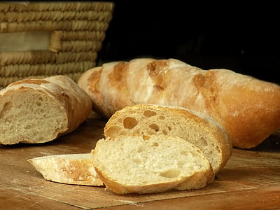 baked breads on brown surface thumbnail