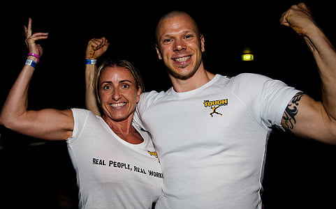 man and woman wearing white shirts beside each other thumbnail