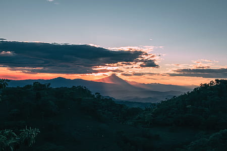 silhouette of mountain under sunset thumbnail