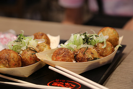 selective focus photography of Takoyaki on bowl thumbnail