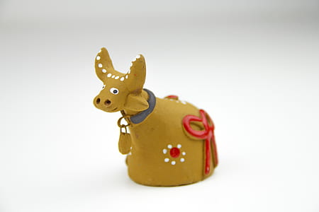 moose figurine on white surface thumbnail