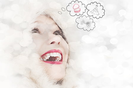 bokeh photography of smiling woman thumbnail