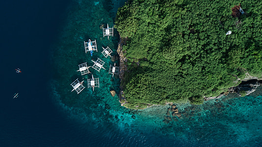 aerial photo of boats on sea thumbnail