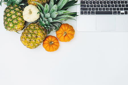 top-view photography of pineapple and squash thumbnail