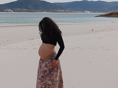 woman standing on beachshore thumbnail