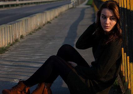 woman wearing black long-sleeved shirt with black leggings photo thumbnail