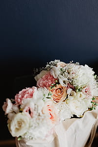 Bouquet of flowers in a bag with some fairy lights thumbnail