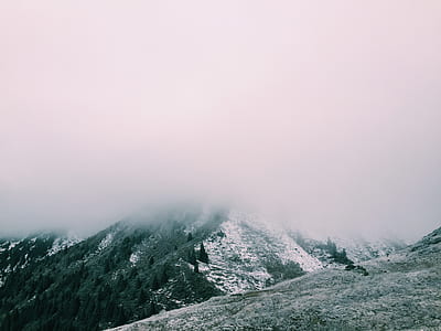 aerial photography of mountain with fog thumbnail