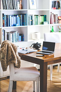 fleece vest on chair in front of table thumbnail