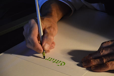 person writing on paper thumbnail