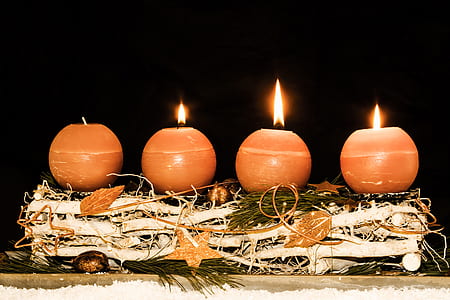 four red candles on leaf thumbnail