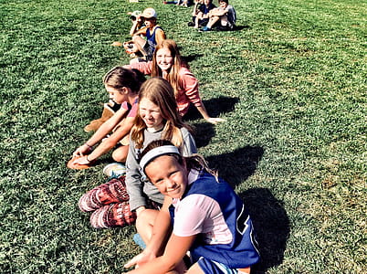Photography of People On Grass Field thumbnail