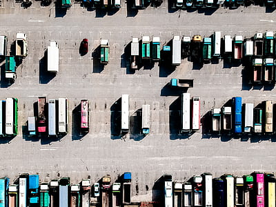 aerial photography of vehicle parked on road thumbnail