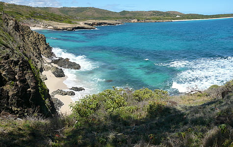 sea waves crashing on island thumbnail