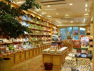 brown wooden shelves with assorted items thumbnail