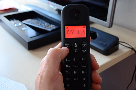 black remote control reading 10/02 thumbnail