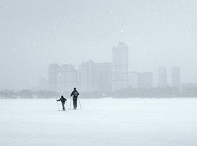two people skiing during daytime thumbnail