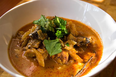 cooked food with soup in bowl thumbnail