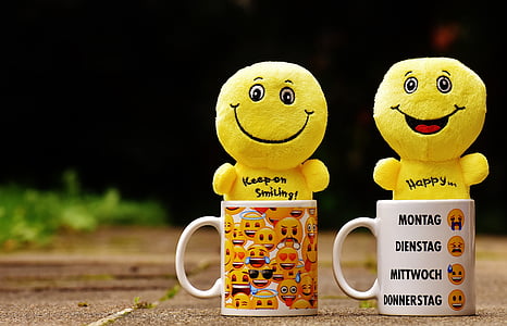 emoji plush toy in white ceramic emoji print mug thumbnail