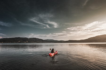person kayaking on lake thumbnail