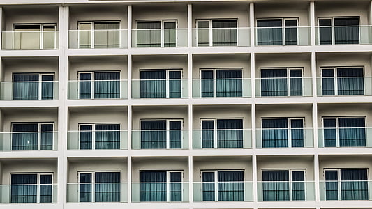 white concrete high-rise building thumbnail