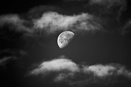 half moon on cloudy sky thumbnail