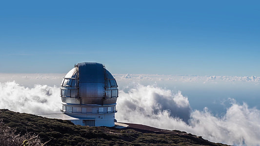 photo of structure on top of mountain during daytime thumbnail