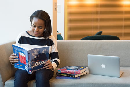 person, woman, books, laptop thumbnail