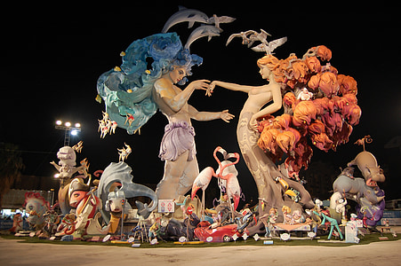 blue and brown haired woman tree-themed statues thumbnail
