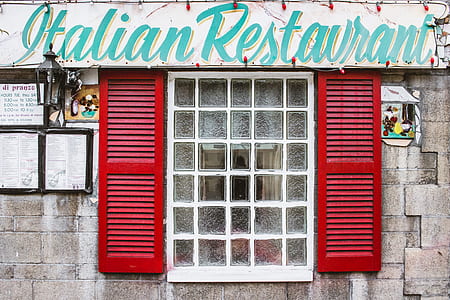 Italian Restaurant signage beside window thumbnail