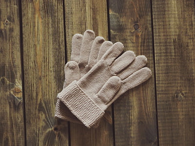 pair of brown knitted gloves thumbnail
