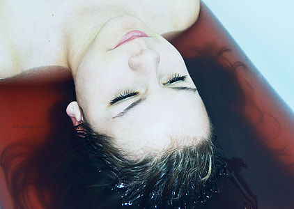 woman lying on water thumbnail