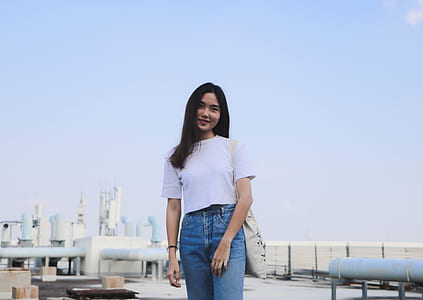 woman standing in front of camera thumbnail