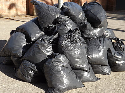 pile of black plastic bag lot thumbnail