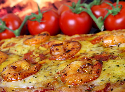 shrimp cheese pizza beside red tomatoes thumbnail