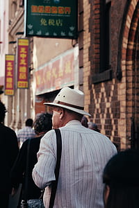 man wearing white fedora hat thumbnail