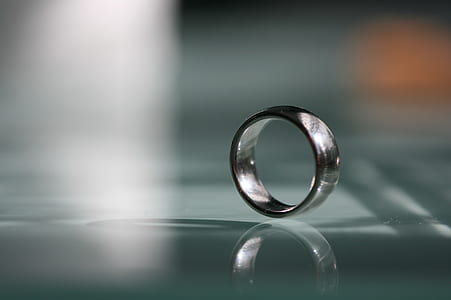 selective focus photography of silver-colored ring thumbnail