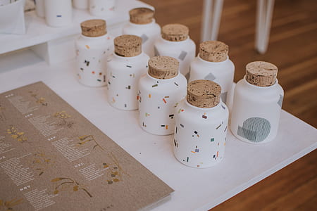 eight white cork vials thumbnail