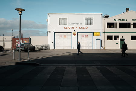 man walking near establishment thumbnail