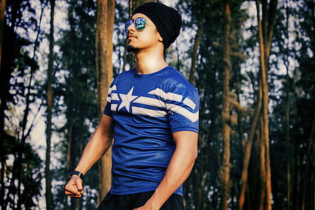 Man Wearing Sunglasses Standing Near Tree thumbnail