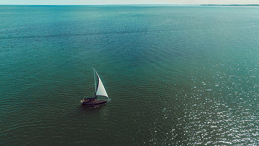 sailing boat on body of water thumbnail