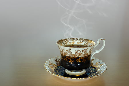photography of white teacup filled with hot coffee thumbnail