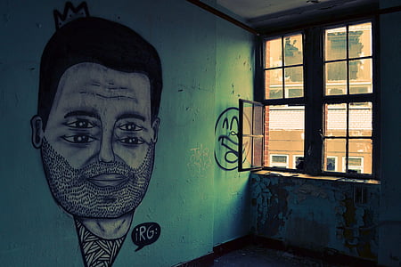 man's face graffiti near windowpane thumbnail