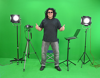 man in black shirt near camera thumbnail