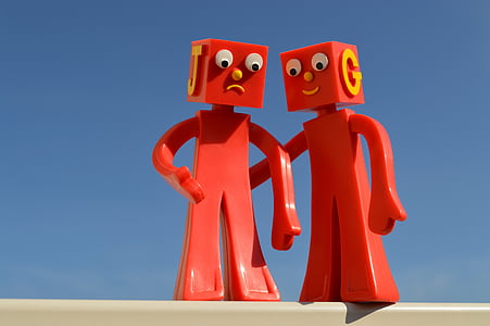 two red plastic cartoon characters thumbnail